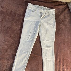 Old navy rockstar white jeans.